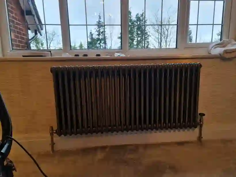 Black column radiator fitted by Marple Flame Heating and Plumbing
